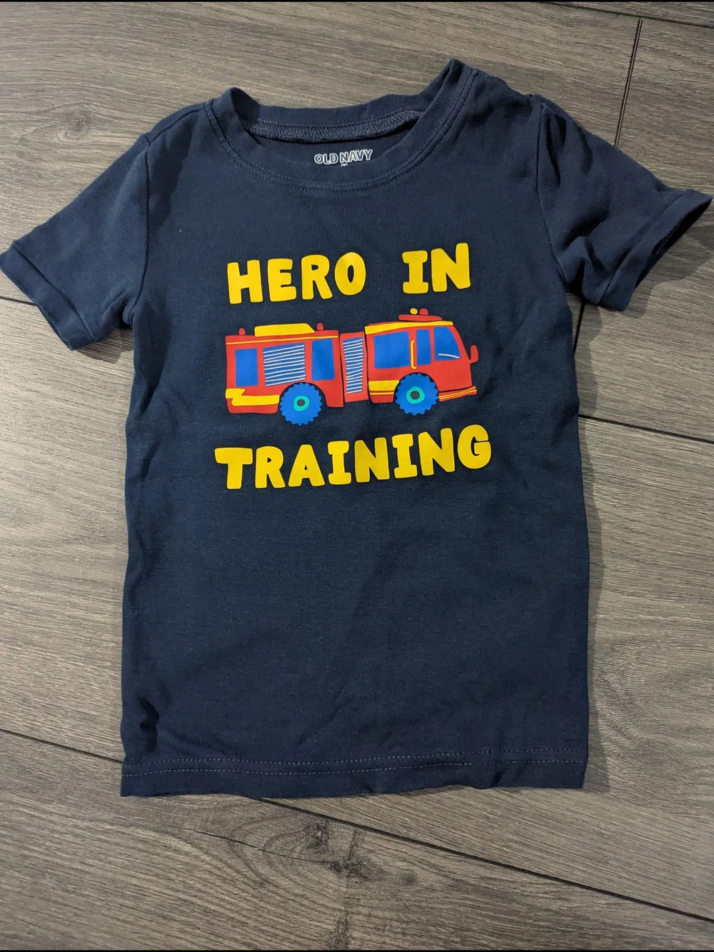 Old Navy Navy Short Sleeve Tee with Yellow 'Hero in Training' Fire Truck Graphic